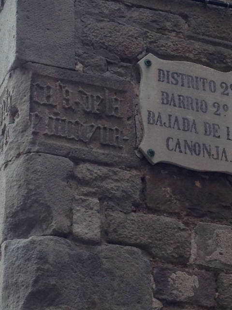 image shows: Old and new street signs