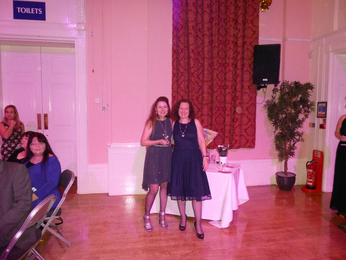 image shows: With Sue Moorcroft, Last Year's Winner, Receiving Award for Best Historical Read