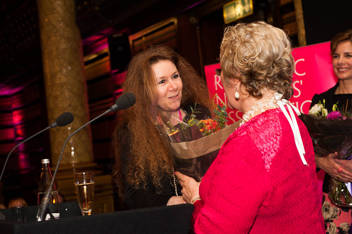 image shows: Presenting flowers to the lovely Katie Fforde