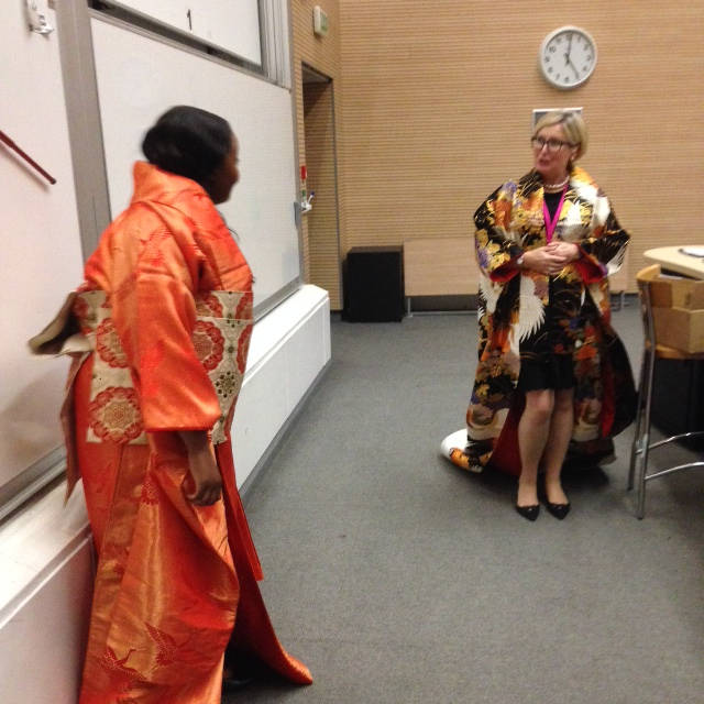 image shows: Our two volunteers in â€˜uchikakeâ€™ kimono robes