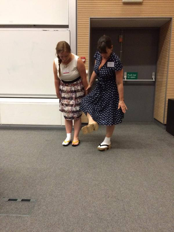 image shows: Lucie Wheeler and Katrina Power trying on â€˜zoriâ€™ and â€˜getaâ€™ (with tabi socks)