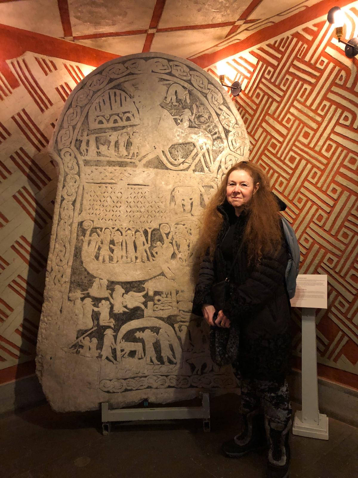 image shows: Viking Research: Me standing next to a rune stone